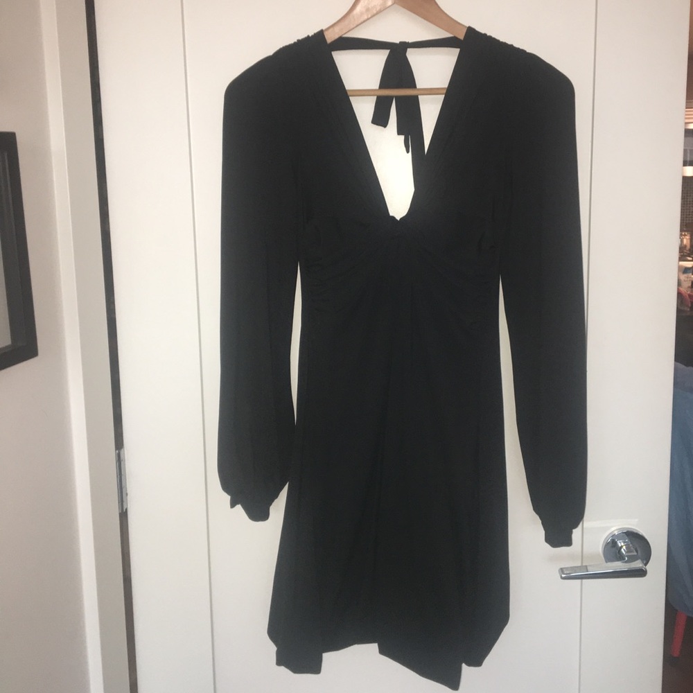 Plunging V mini dress with sexy back tie closure
